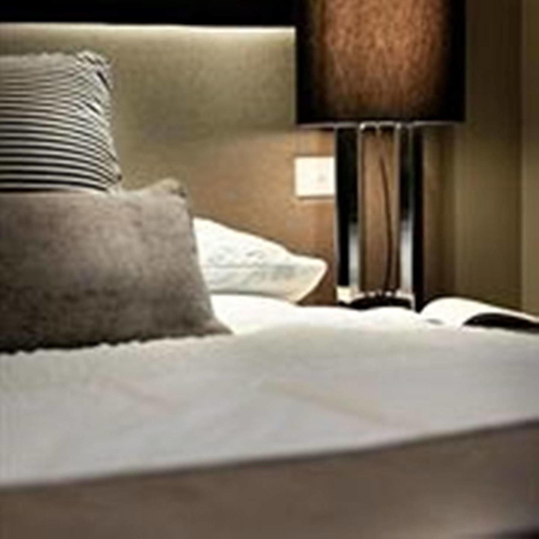 Fraser Suites Perth Zewnętrze zdjęcie A bed